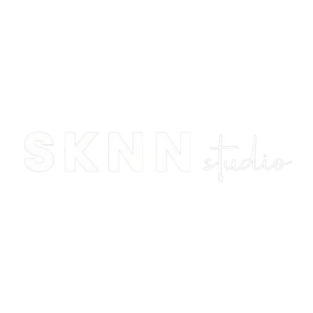 Faint white “SKNN + studio” logo on a plain white background