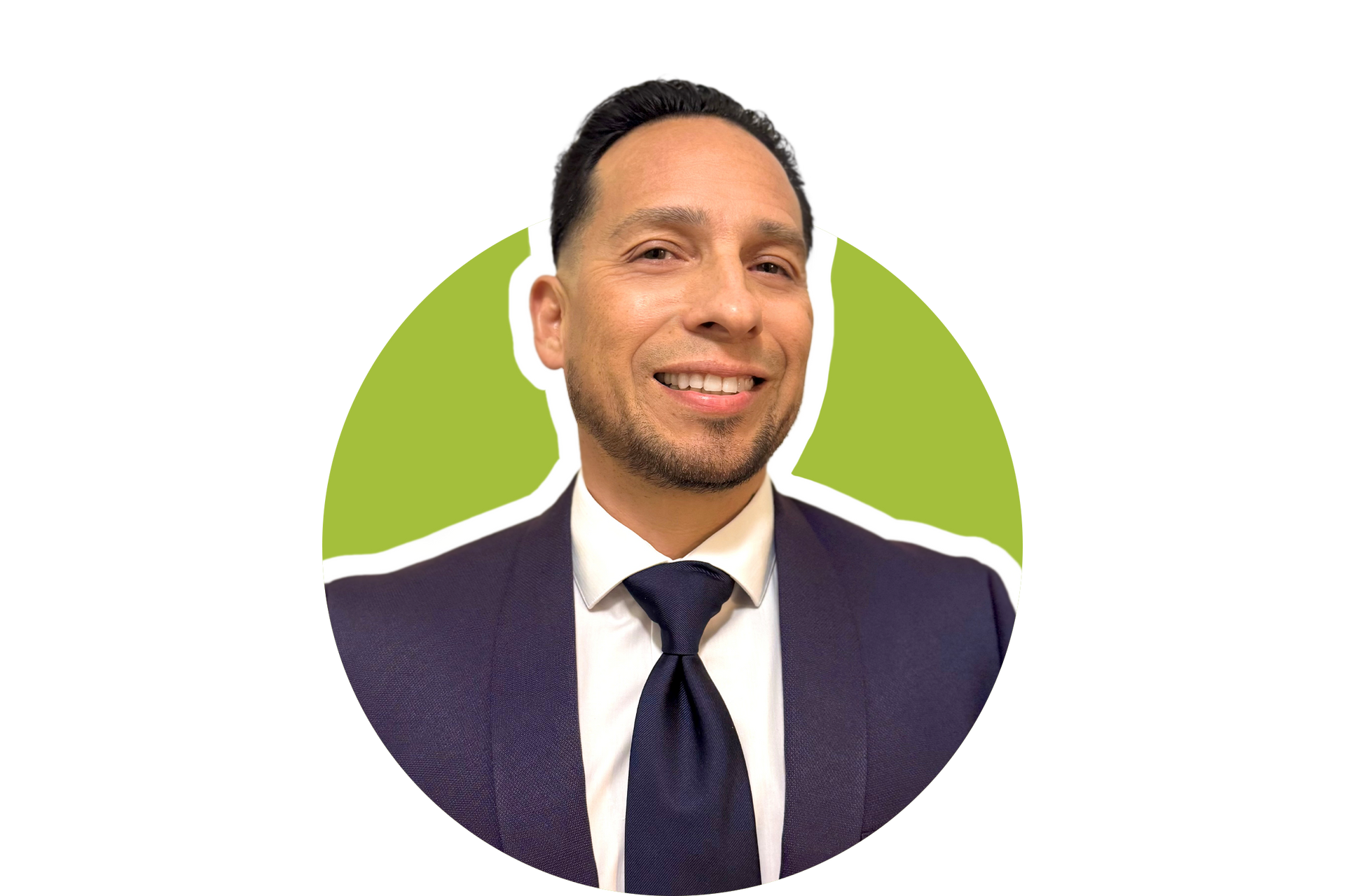 Smiling man in a dark suit and tie on a green-and-white circular background