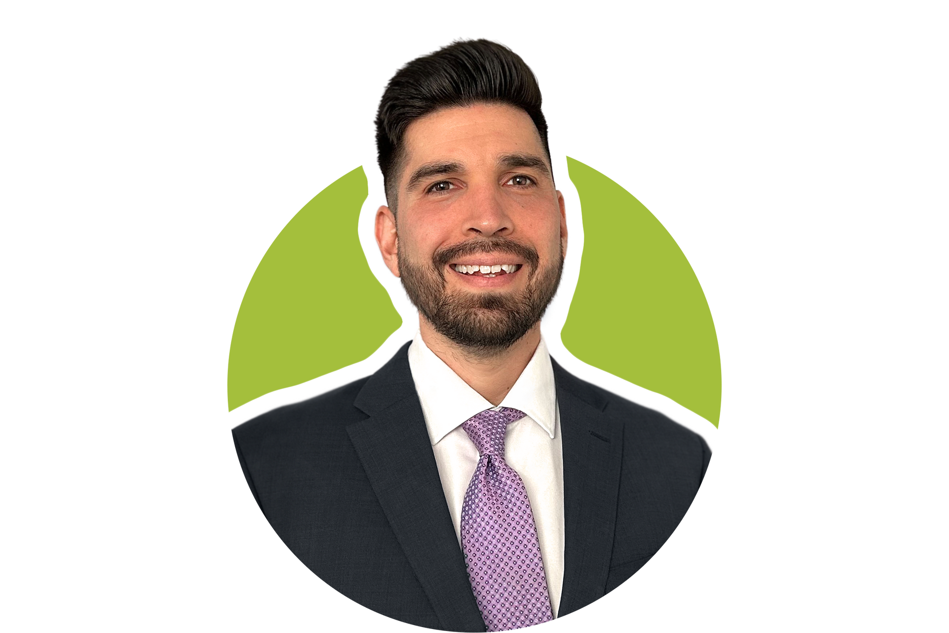 A person with a beard, wearing a dark suit, white shirt, and patterned purple tie, smiles against a green circular backdrop.