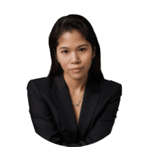 Studio headshot of a person in a black blazer against a white background