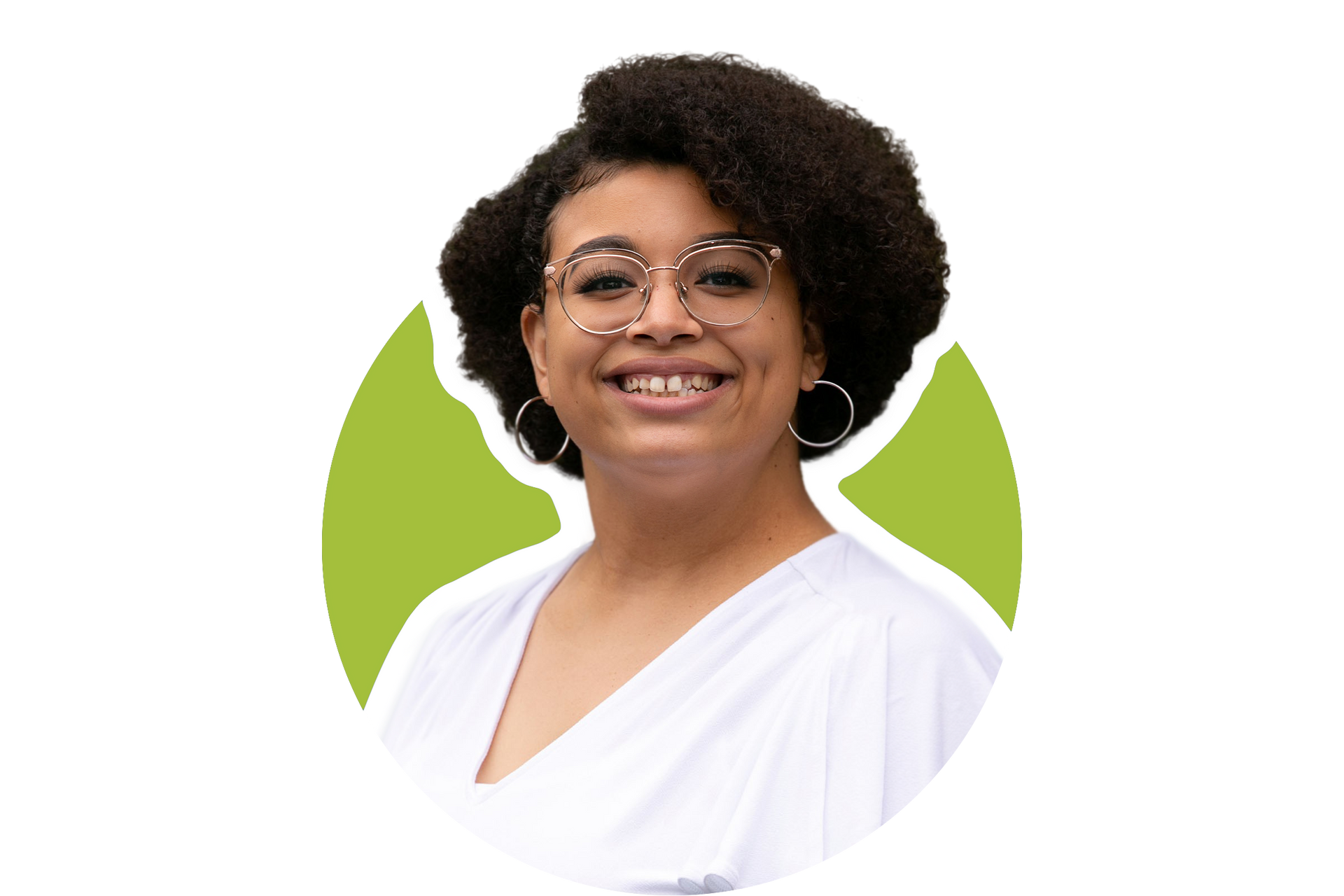 Smiling person with curly hair and glasses in a white top against a green circular background