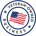 Veteran-owned business seal with U.S. flag centered in a blue circular border