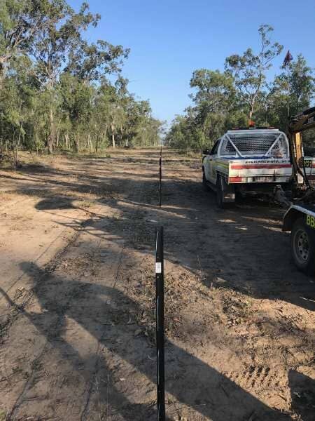 A Truck Is Parked On The Side Of A Dirt Road — Mulch, Fencing And Landscaping Mackay, QLD