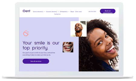 A laptop with a picture of a woman smiling on the screen.
