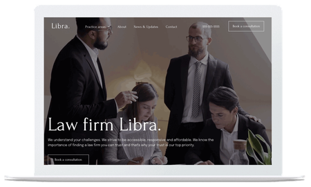 A laptop with a law firm libra website on it.