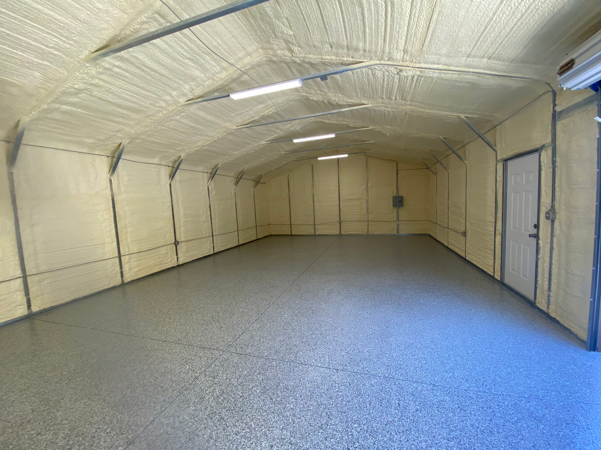 A large empty room with a lot of foam on the walls and floor.