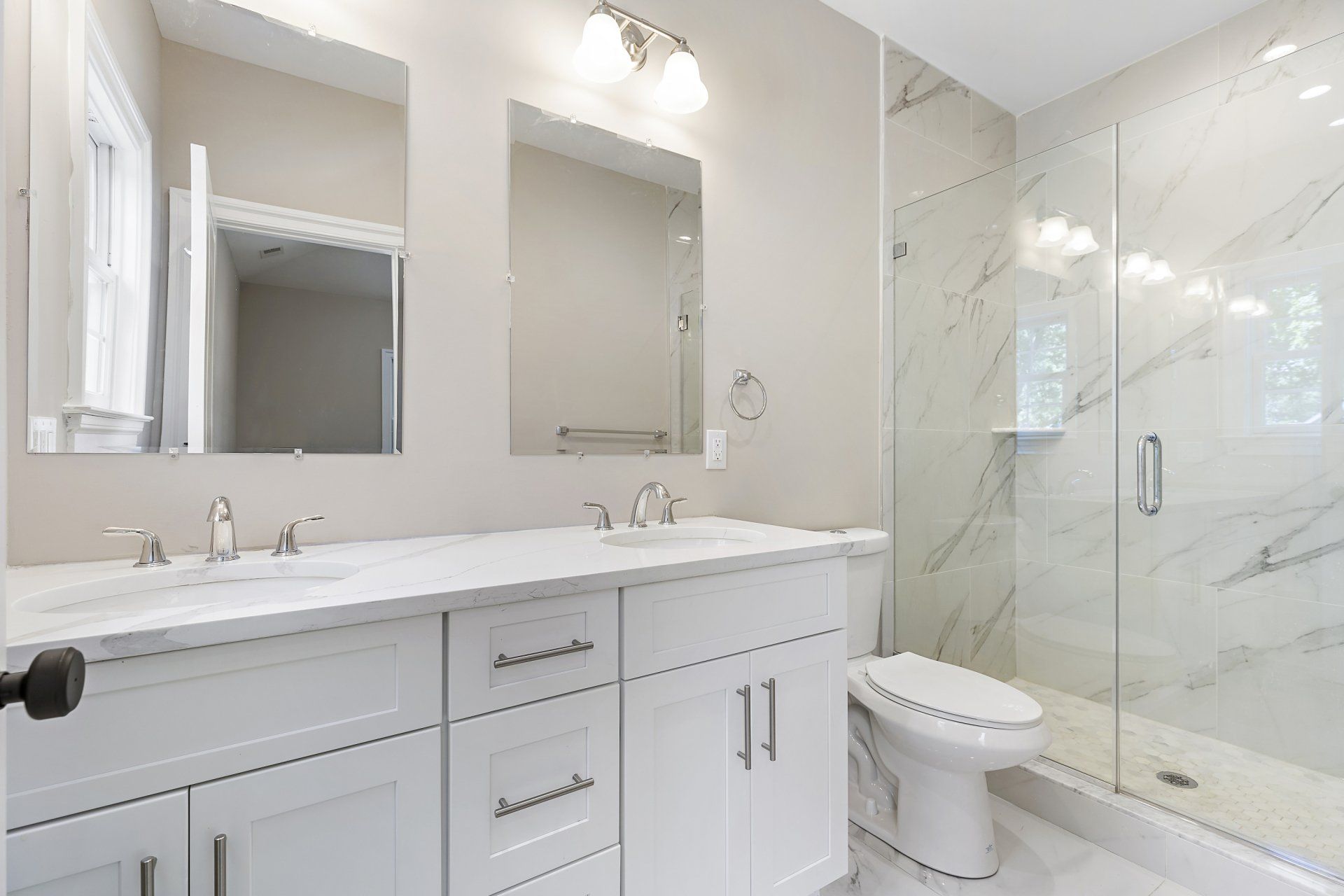 upstairs bathroom with glass shower door