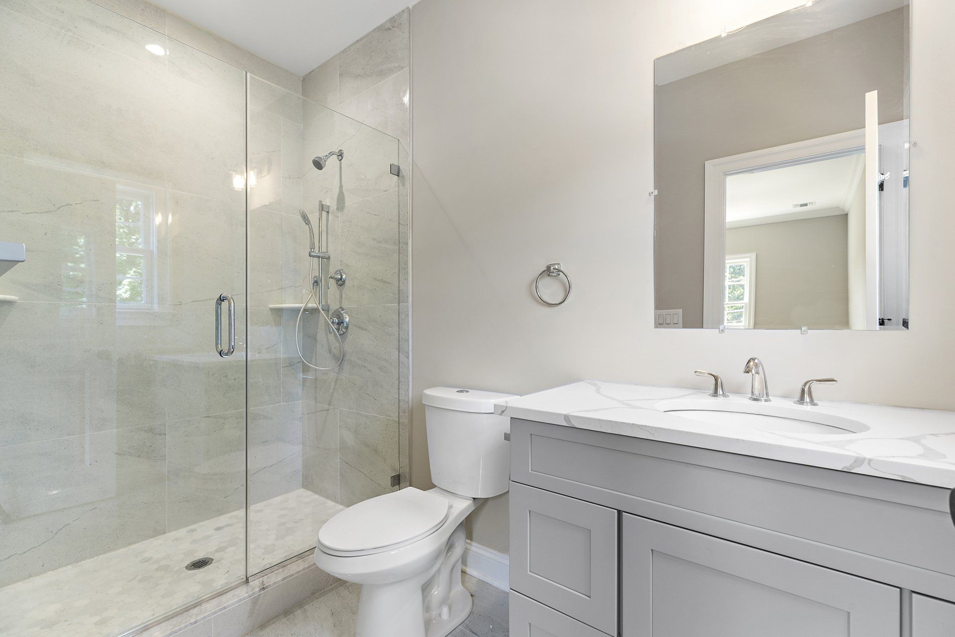 upstairs bathroom with glass shower door and sink