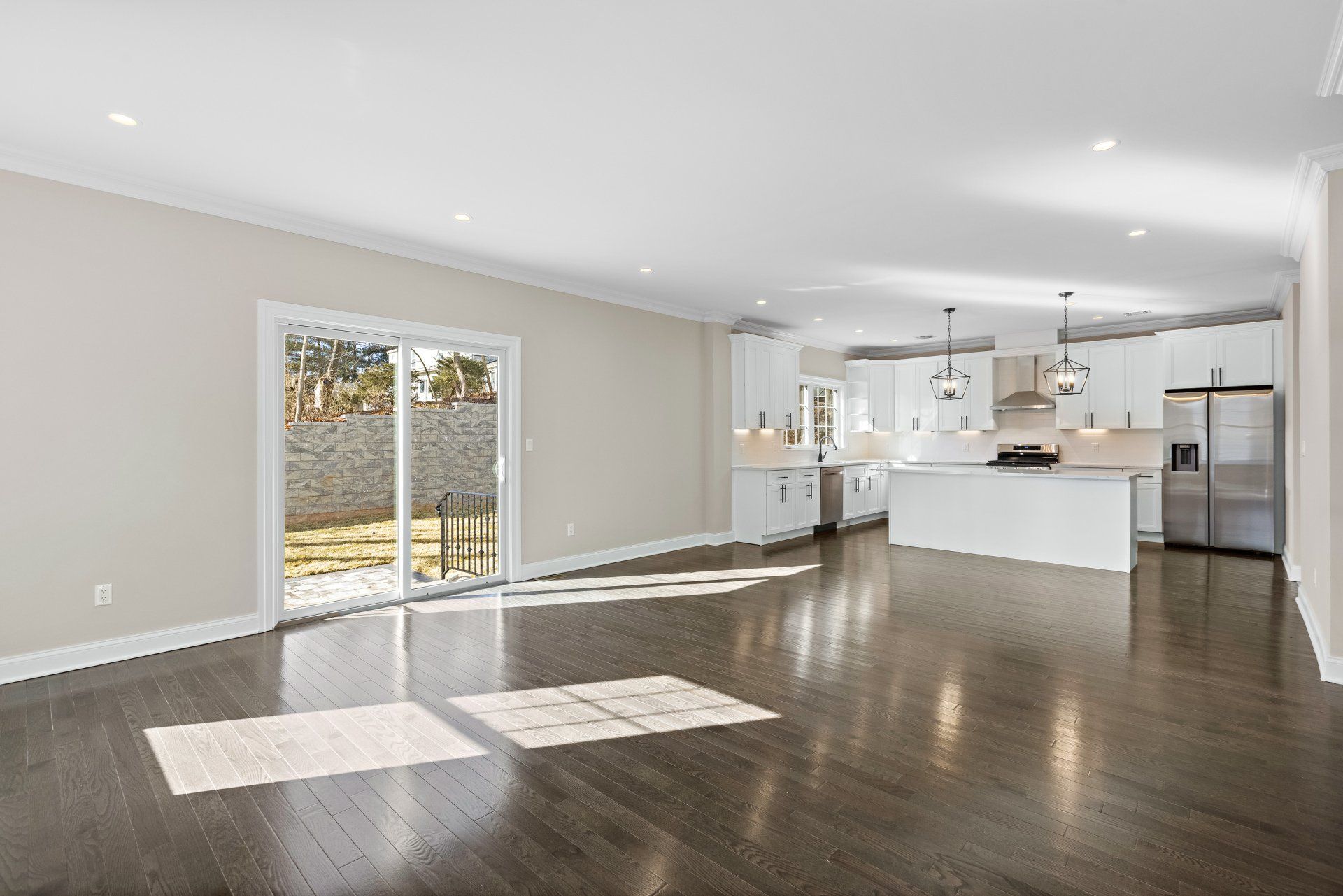 living room and kitchen with fridge