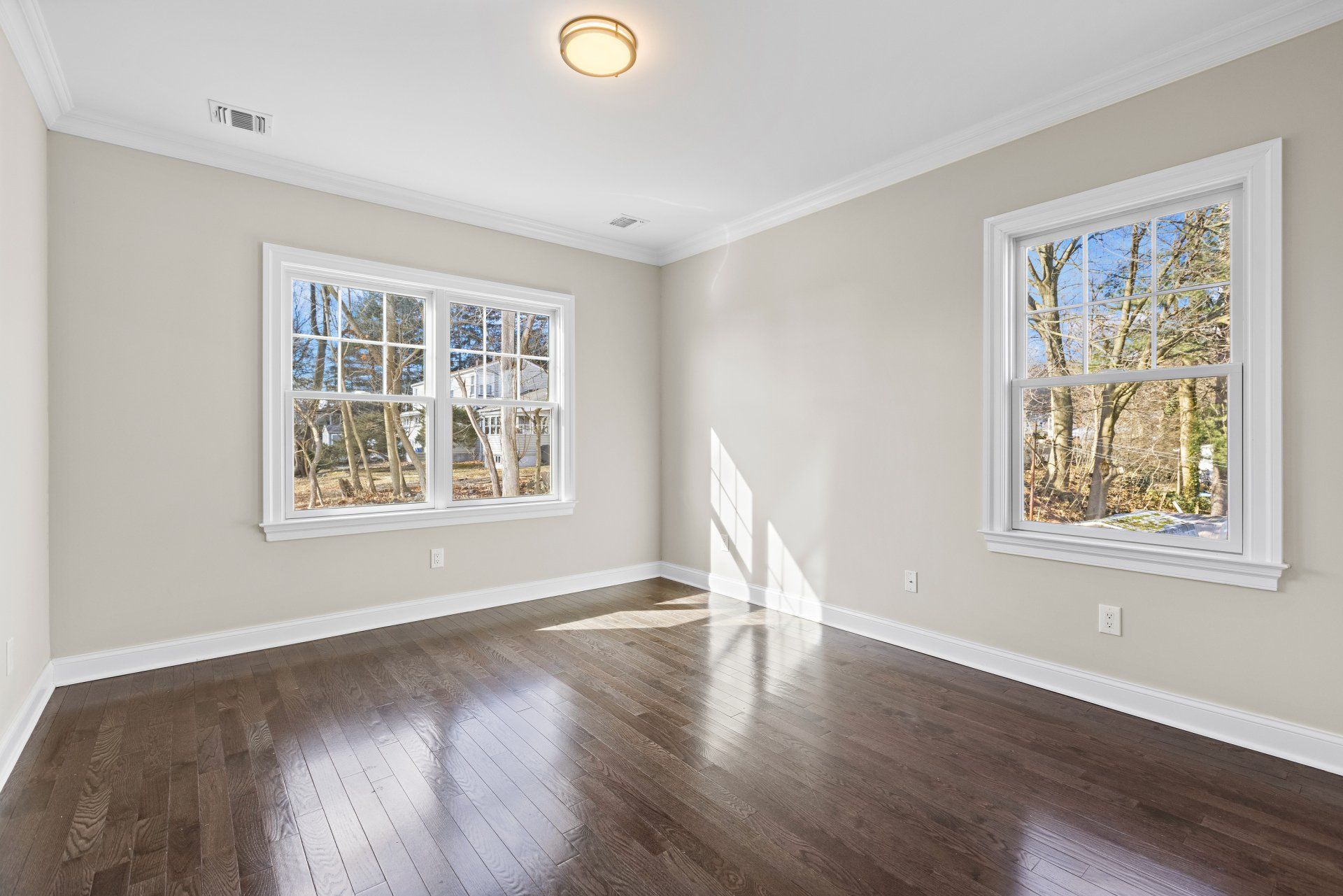 upstairs bedroom with wooden floor