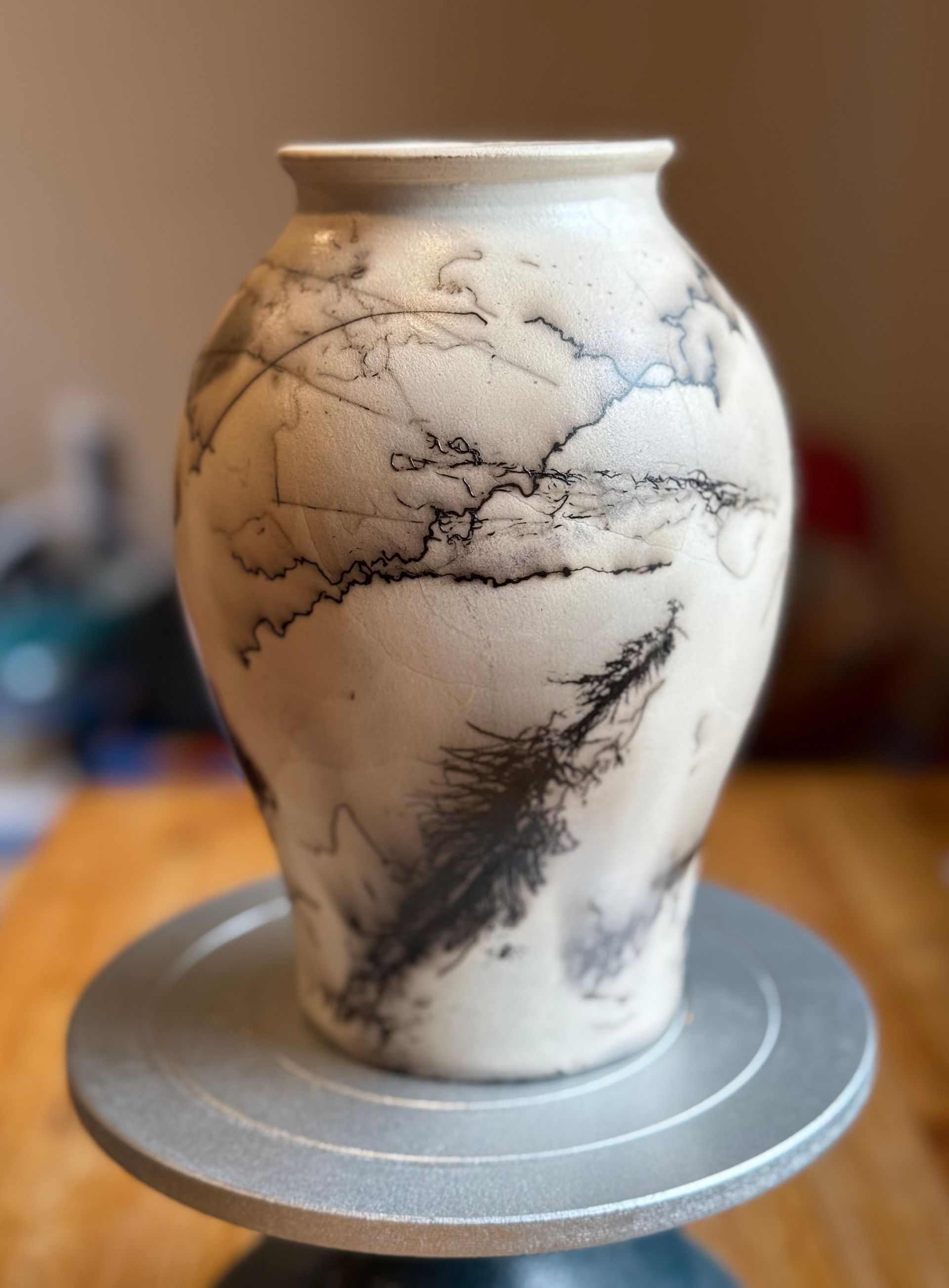 White marbled ceramic vase by artist Peter Dylan O'Connor, Resistance Wine Company, Ashland Oregon