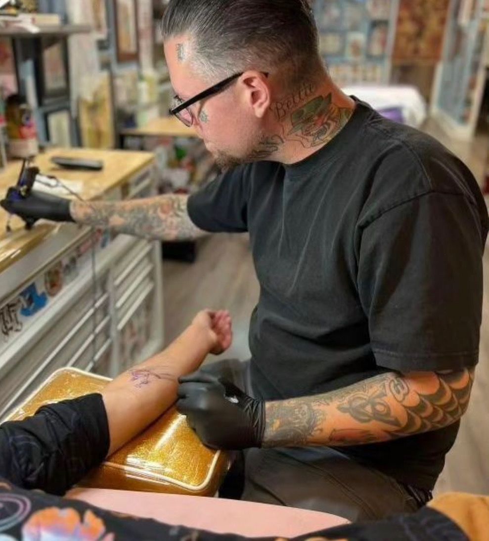 Tattoo artist at the Tattoos, Tempranillo and Tacos pop-up at Resistance Wine Company, Ashland Oregon