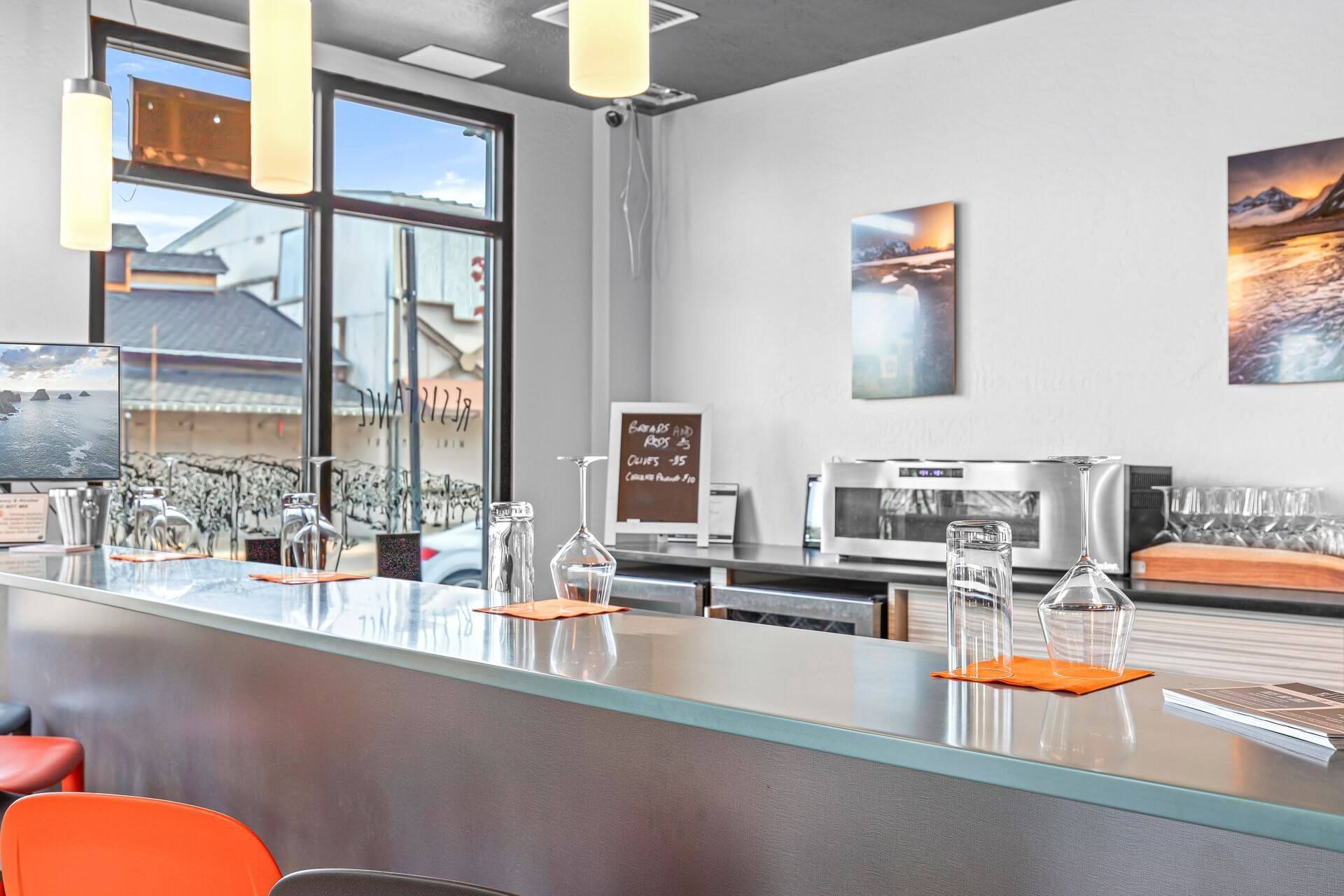 The tasting bar at Resistance Wine Company in downtown Ashland, Oregon, where a four-pour flight costs $20