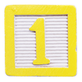 Yellow wooden block with the number 1.