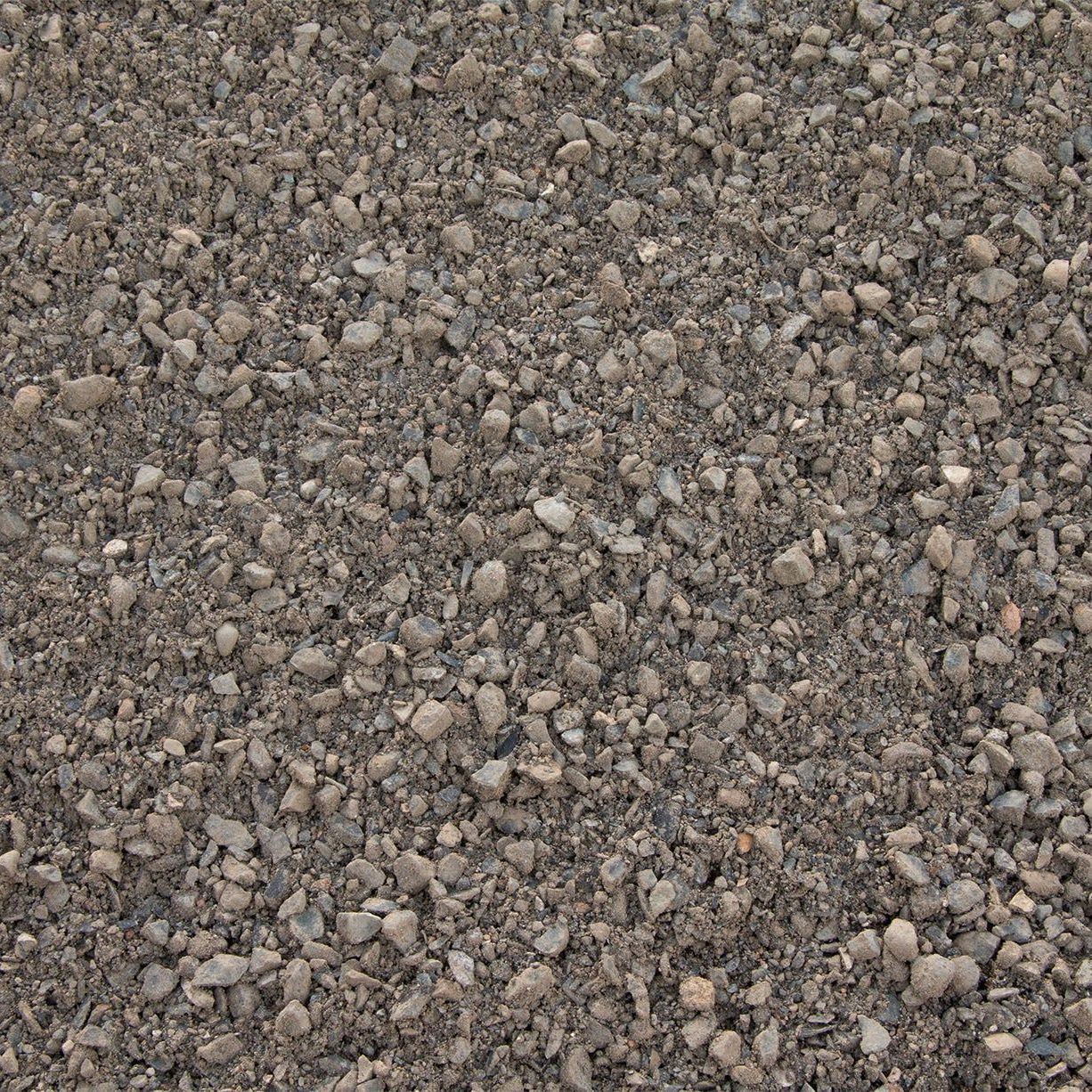 Close-up of small gray and tan gravel stones filling the frame.