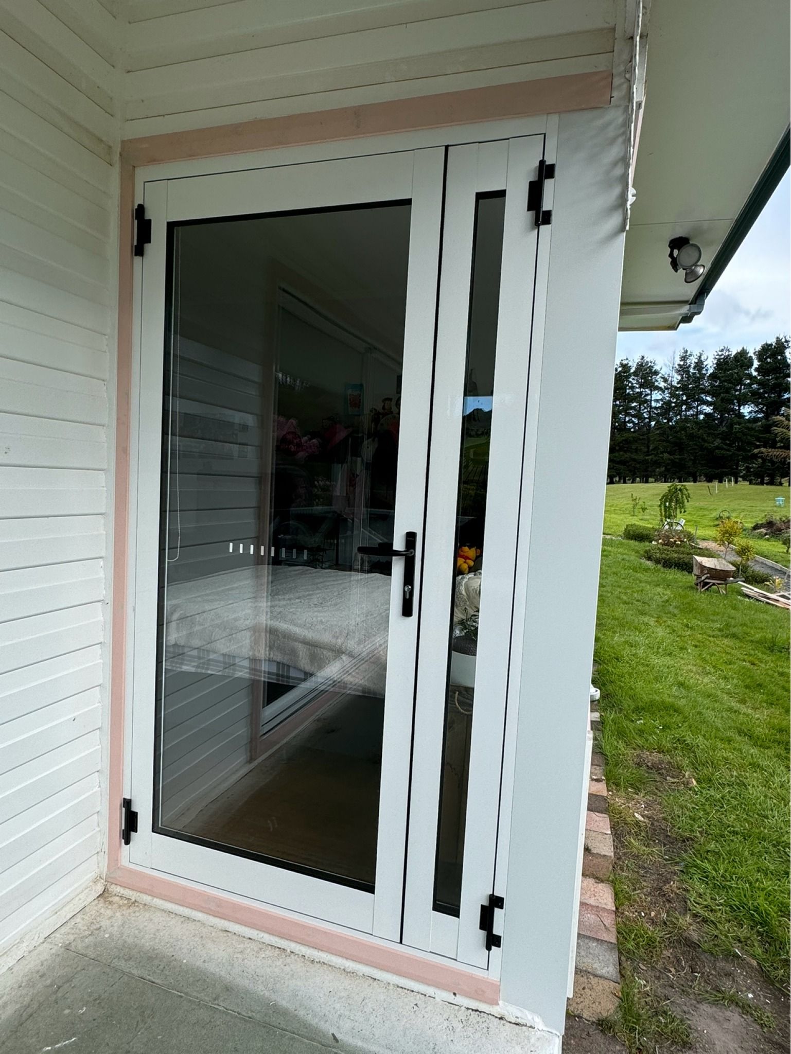 A White-framed Glass Door With a Black Handle — Channel Glazing In Electrona, TAS