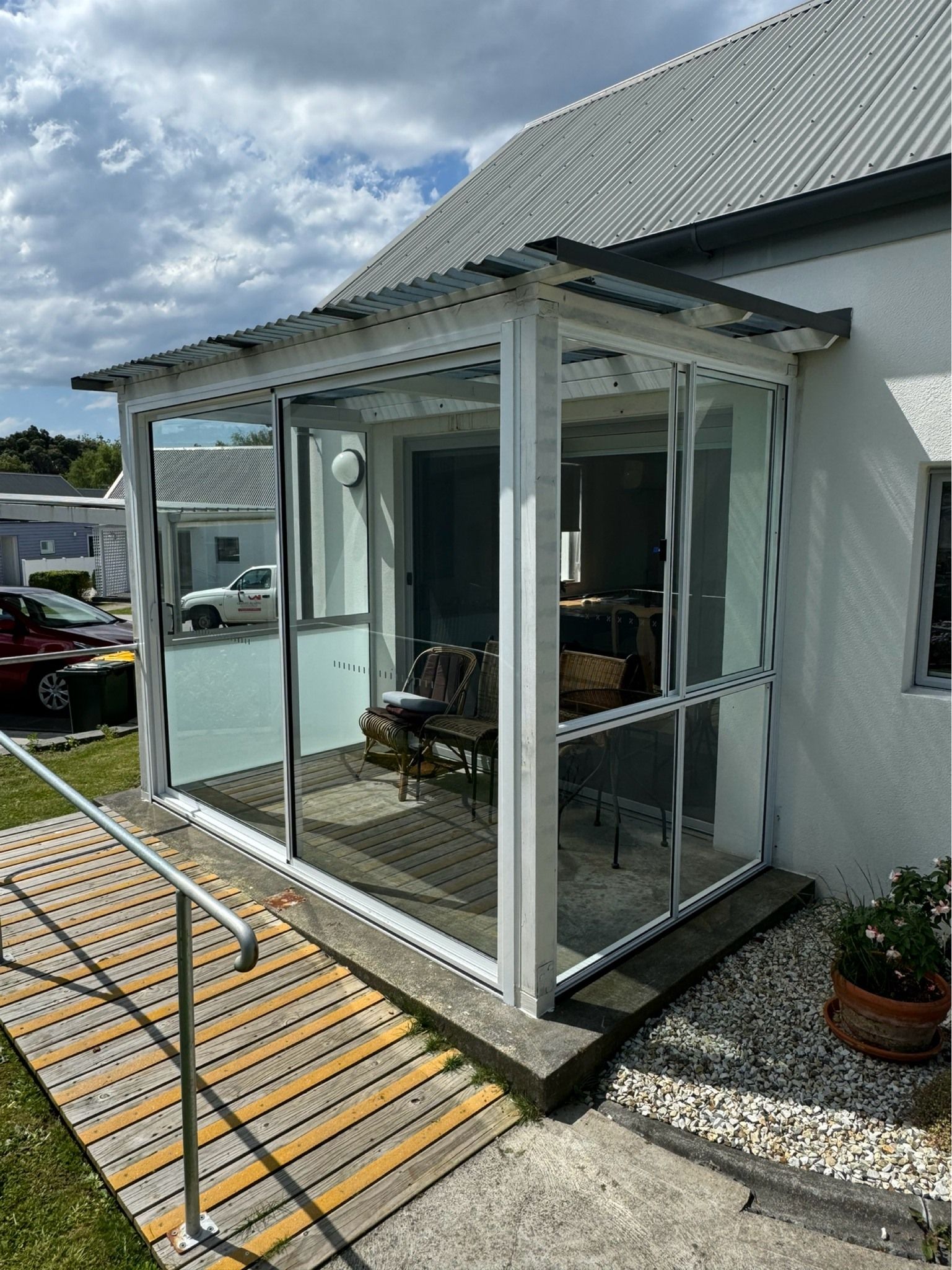 A White-framed Porch Enclosure With Clear Vinyl Walls — Channel Glazing In Electrona, TAS