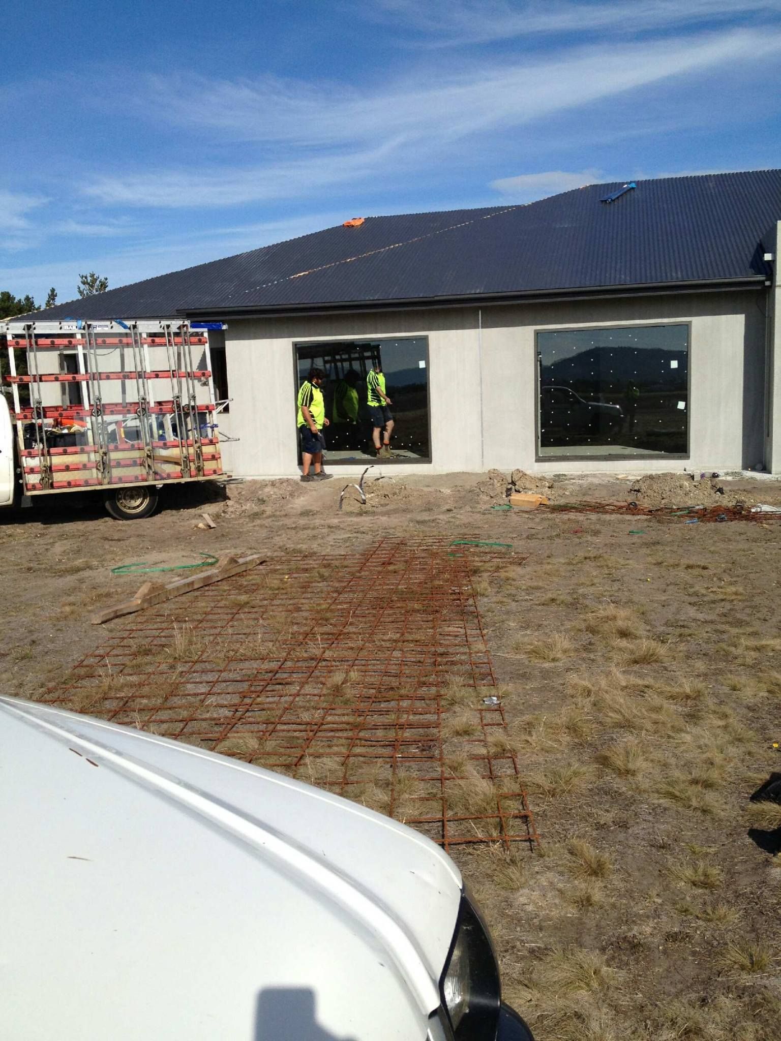 Workers in High-visibility Vests Install Large Glass Windows — Channel Glazing In Electrona, TAS