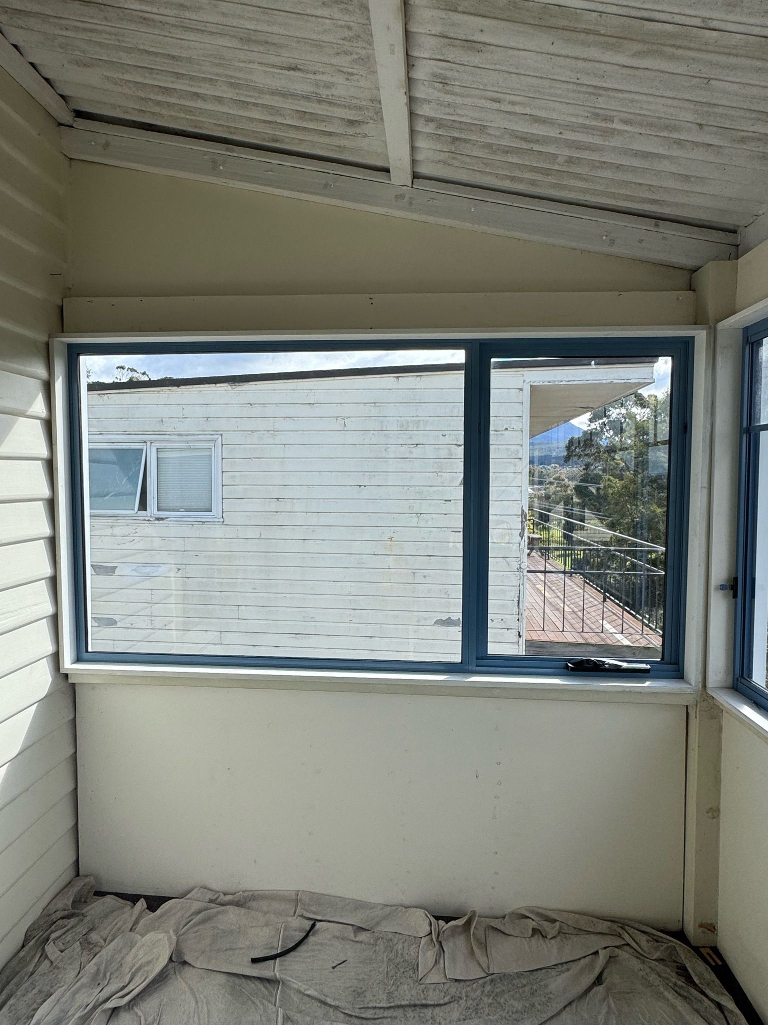 An Interior View of a Sunroom Featuring a Rectangular Window — Channel Glazing In Electrona, TAS