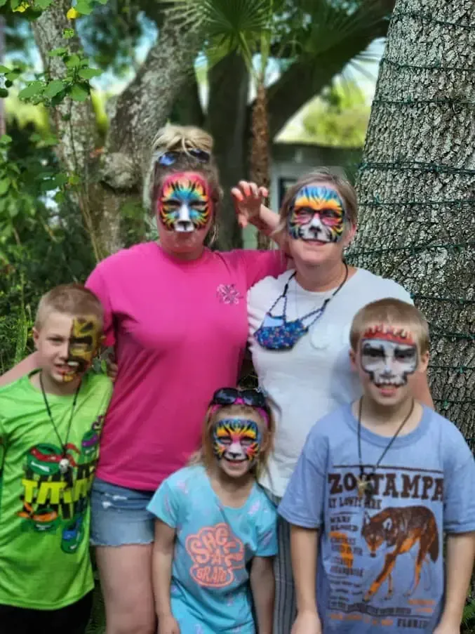 A group of people with face paint on their faces