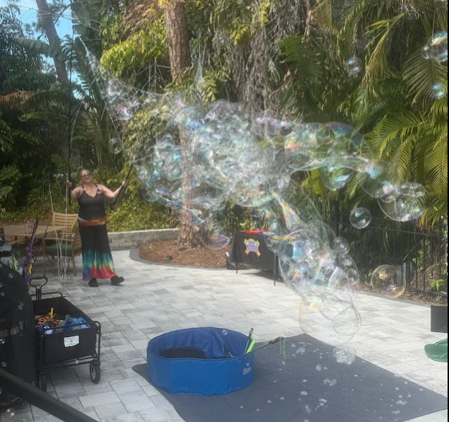 woman outdoors using large bubble net