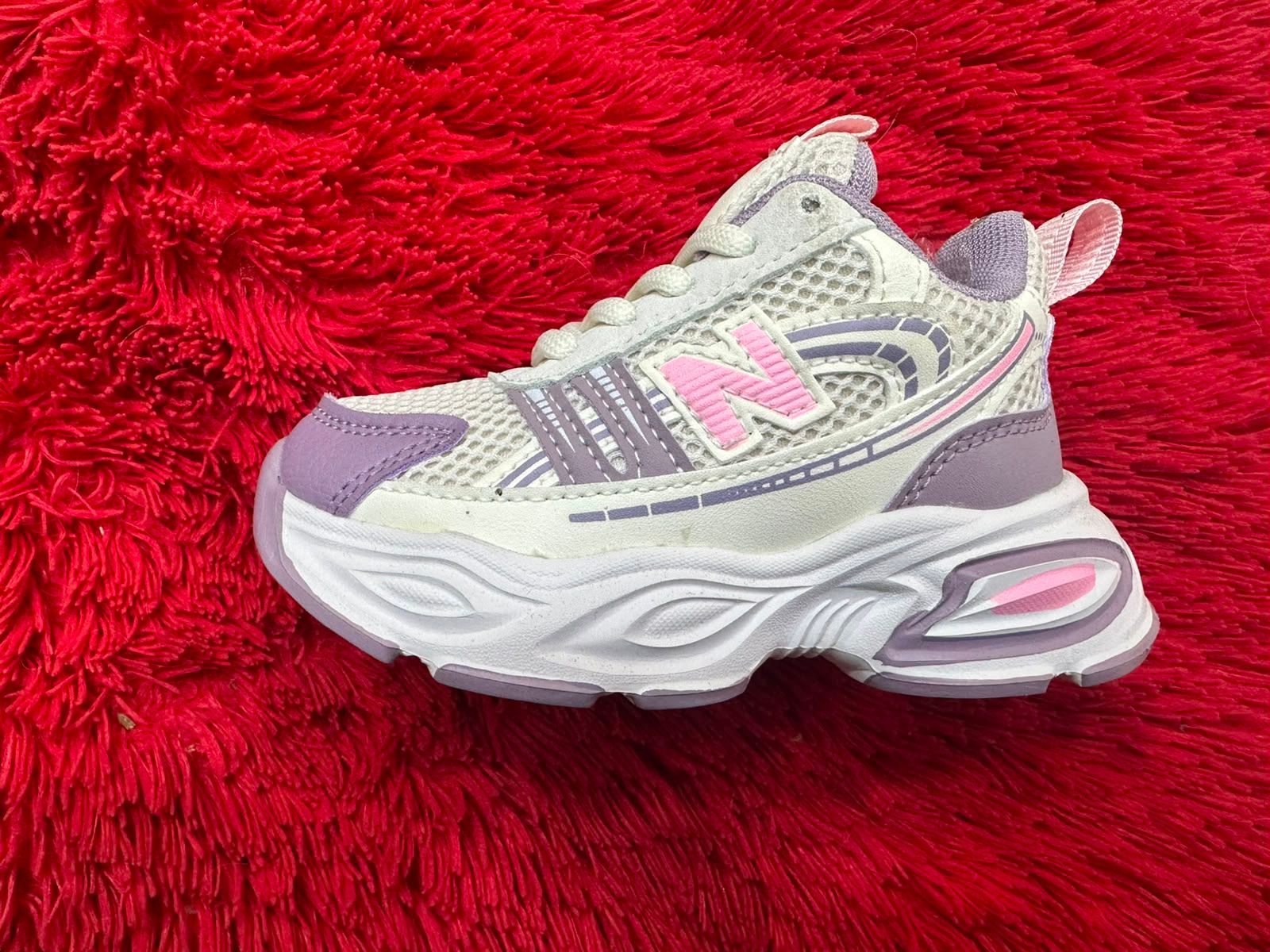 new balance niñal ultraliviana importada.