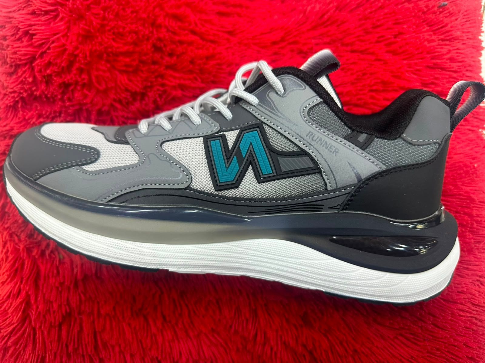 NEW BALANCE SUELA SUSPENSION