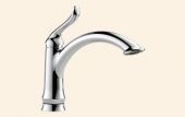 A close up of a chrome kitchen sink faucet on a white background.