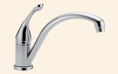 A close up of a chrome kitchen faucet on a white background.