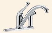 A close up of a chrome kitchen sink faucet on a white background.
