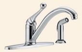 A chrome kitchen faucet with a sprayer attached to it.