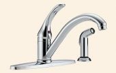 A chrome kitchen faucet with a sprayer attached to it.