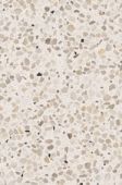 A close up of a white granite counter top.