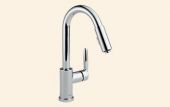 A close up of a kitchen sink faucet on a white background.