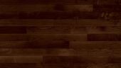 A close up of a brown wooden floor.