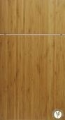 A close up of a wooden door with a screw in it.