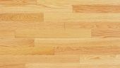 A close up of a wooden floor texture.