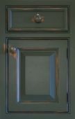 A close up of a door with a drawer and a window.