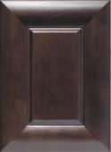 A close up of a brown square wooden cabinet door.