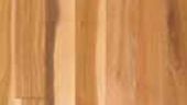 A close up of a piece of wood showing the grain of the wood.