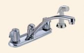 A kitchen sink faucet with a sprayer attached to it.