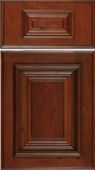 A close up of a wooden cabinet door on a white background.