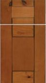 A close up of a wooden cabinet door with drawers.