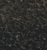 A close up of a black granite counter top.