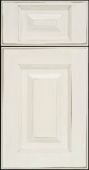 A close up of a white cabinet door on a black background.