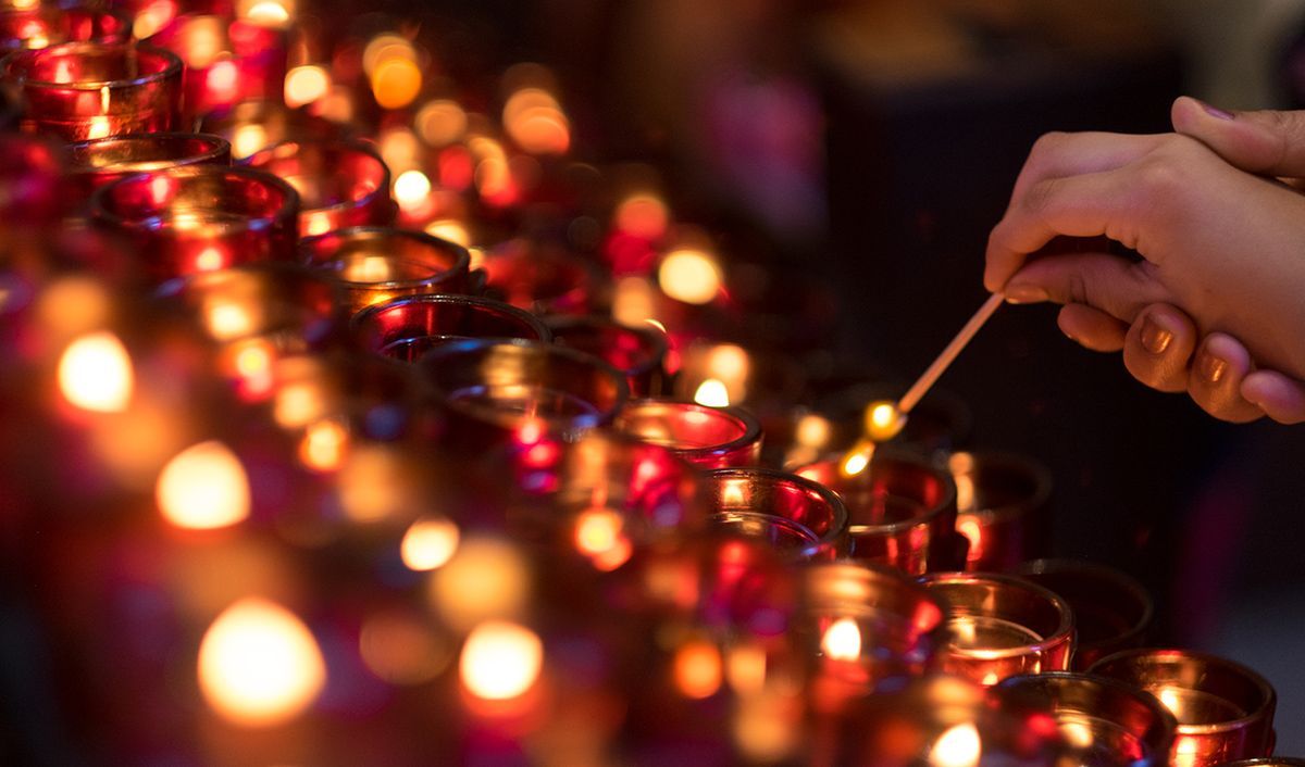 lighting a lot of candles