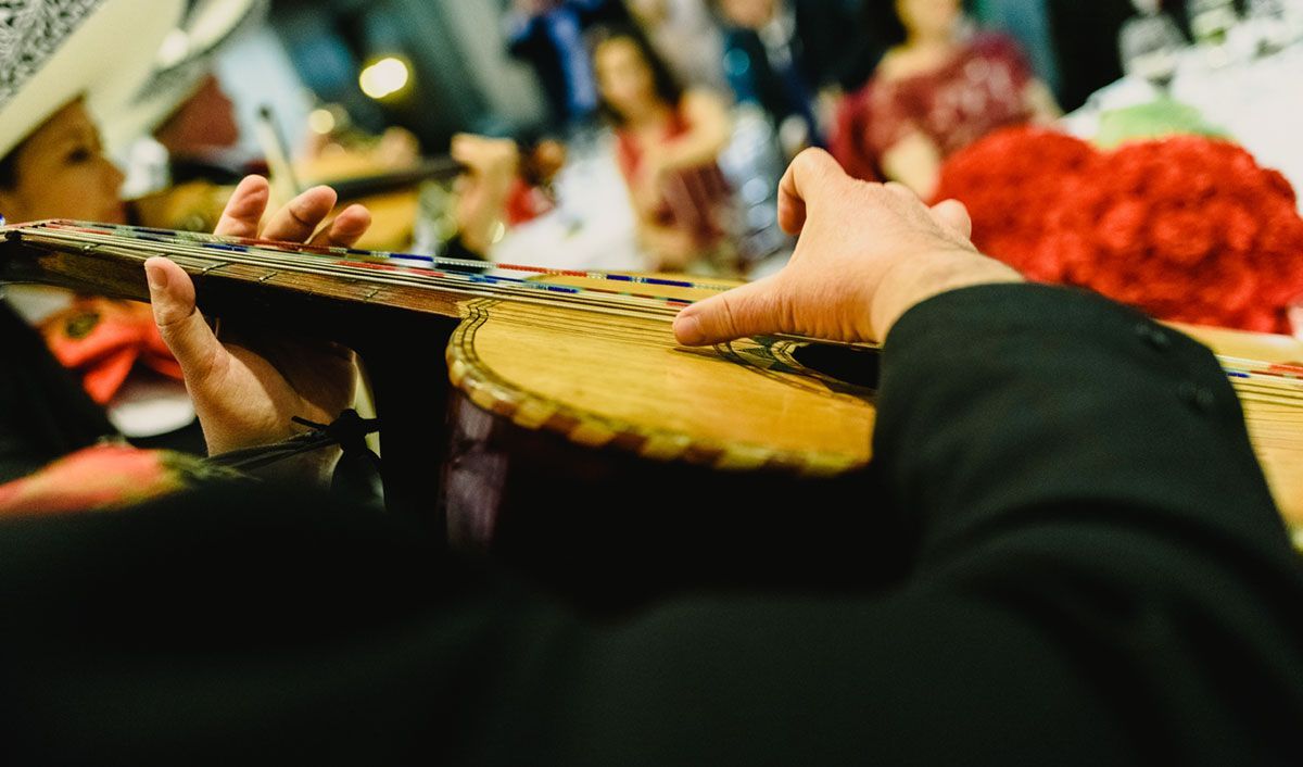 playing an acoustic guitar
