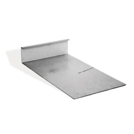 A piece of metal is sitting on a white surface