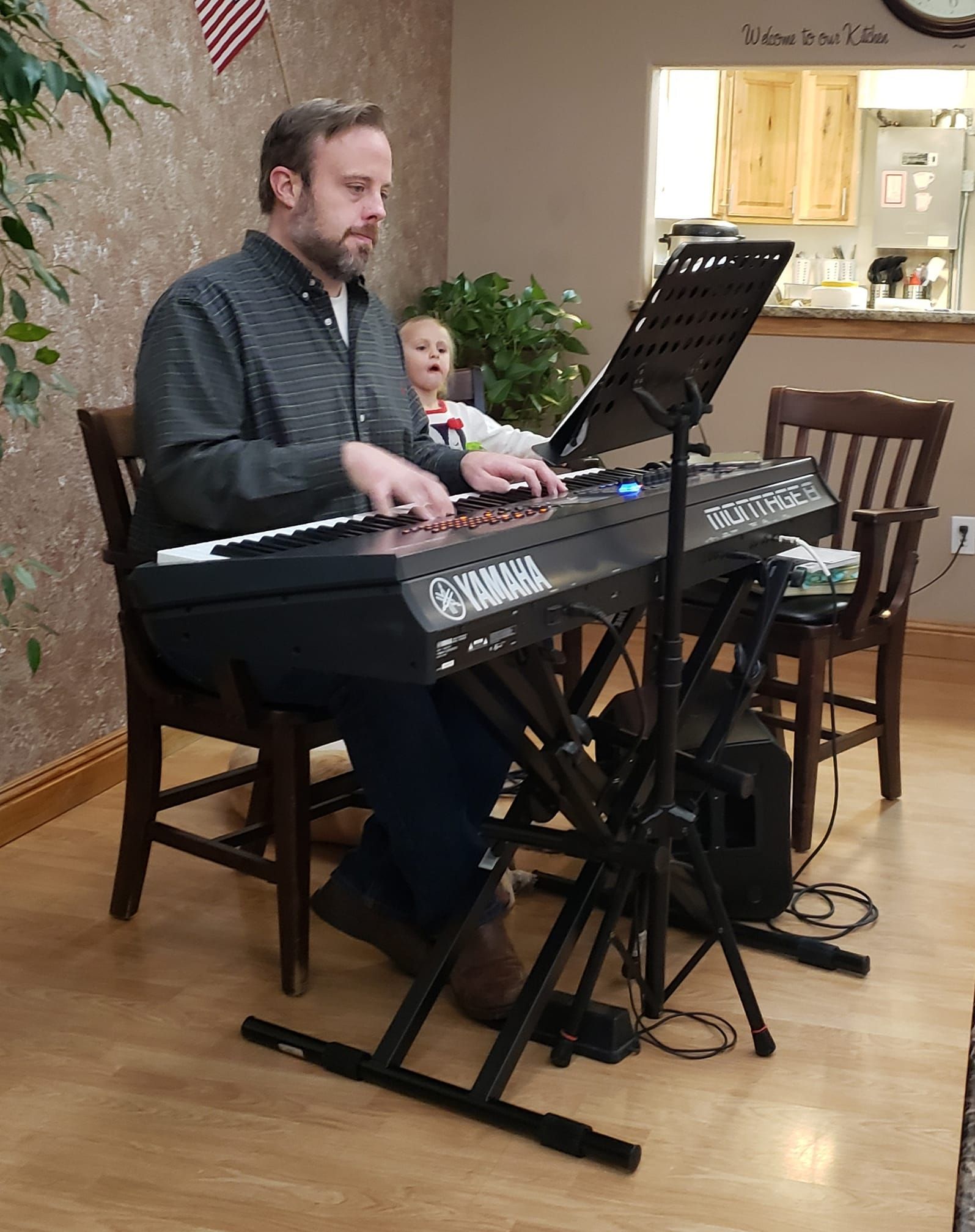 Sheldon from On the Spot Cleaning playing the piano
