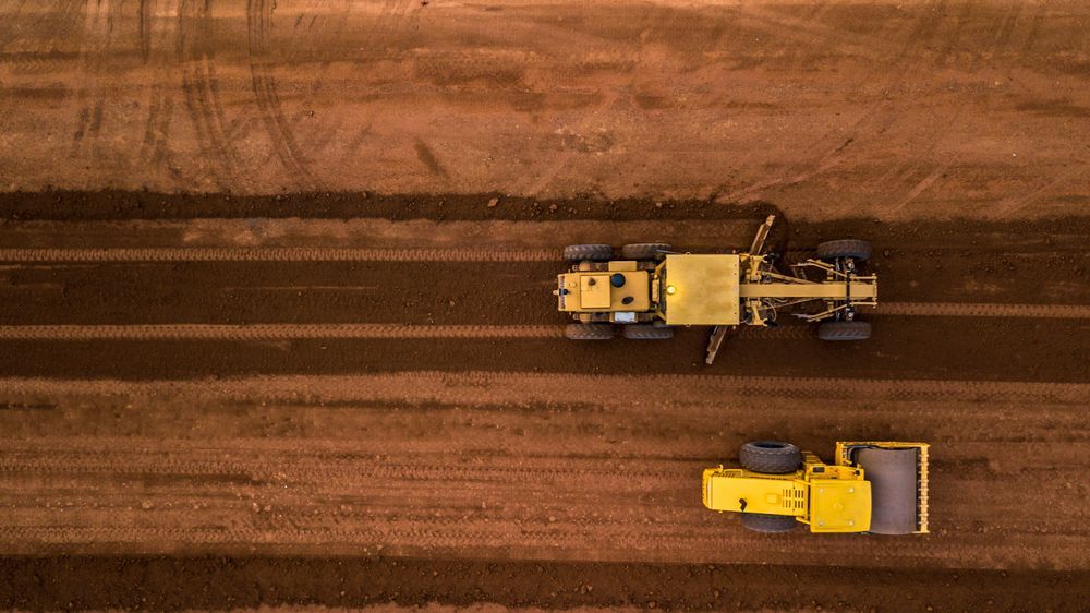 Yellow Construction Machinery Grading and Compacting Earth for A Road — Shantui QLD in Warwick, QLD